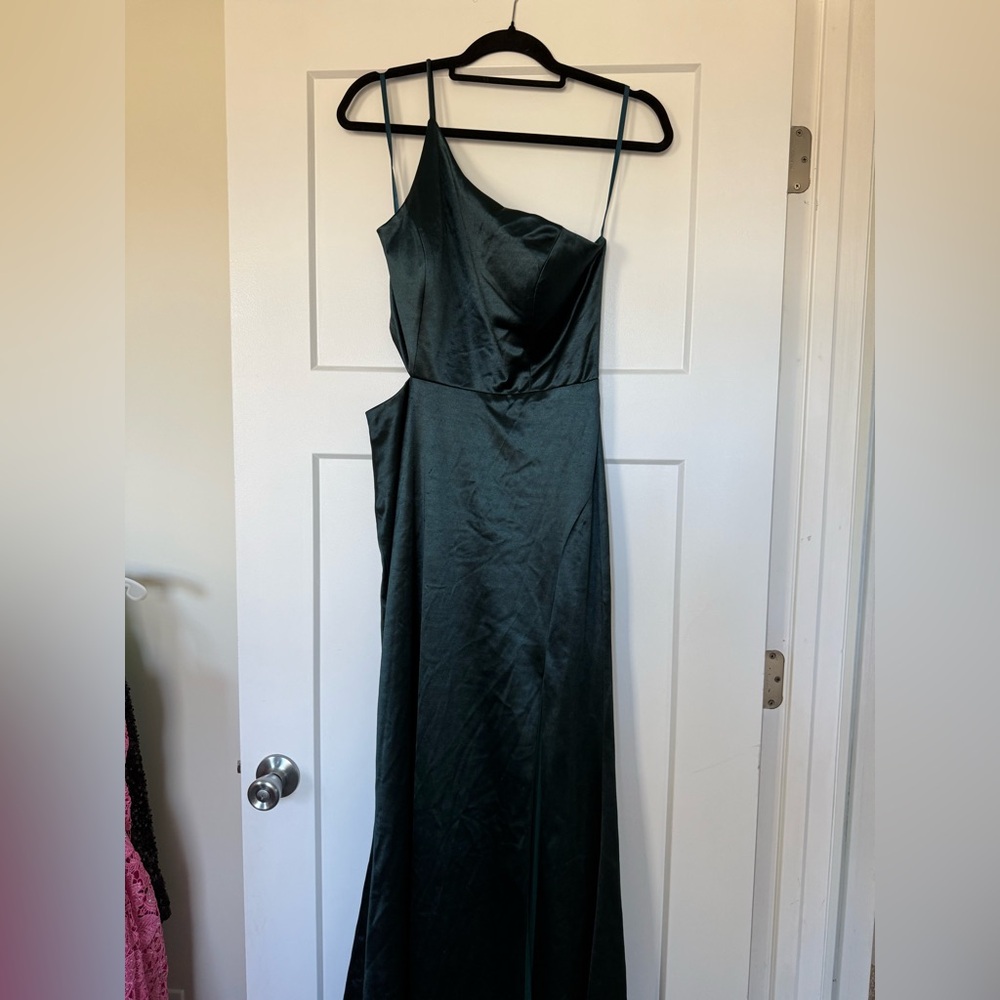 Elegant Emerald Green One-Shoulder Dress from David’s bridal with side slit.